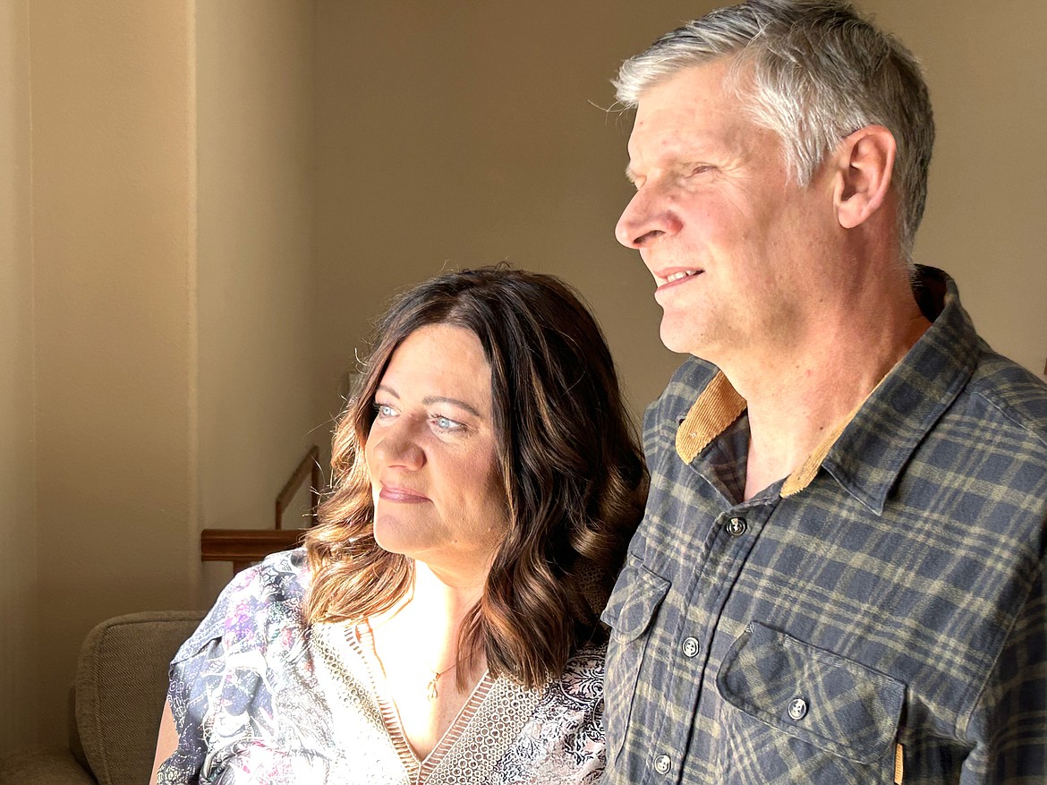 Steve and Kate Prosch look out the window of their Coeur d'Alene home.