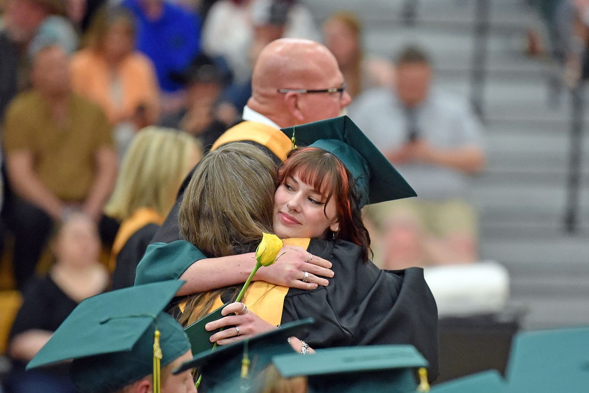 There was no shortage of hugs at the WHS Commencement. (Kelsey Evans/Whitefish Pilot)