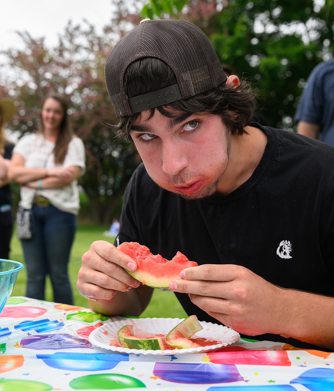 Greg Tatum gets messy during the watermelon eating contest. (Tracy Scott/Valley Press)