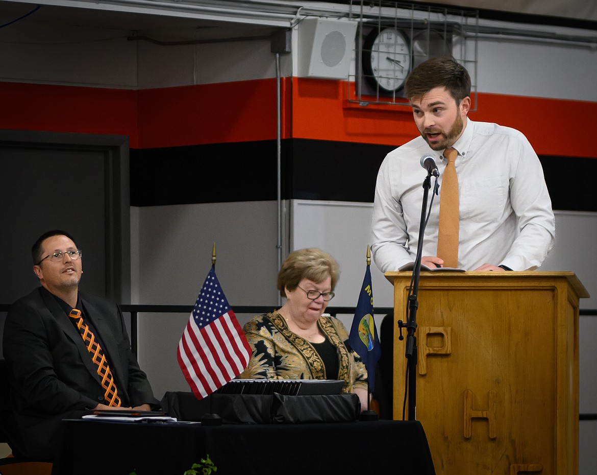 Plains teacher Jaron Laws speaks at the Plains High School graduation ceremony. (Tracy Scott/Valley Press)