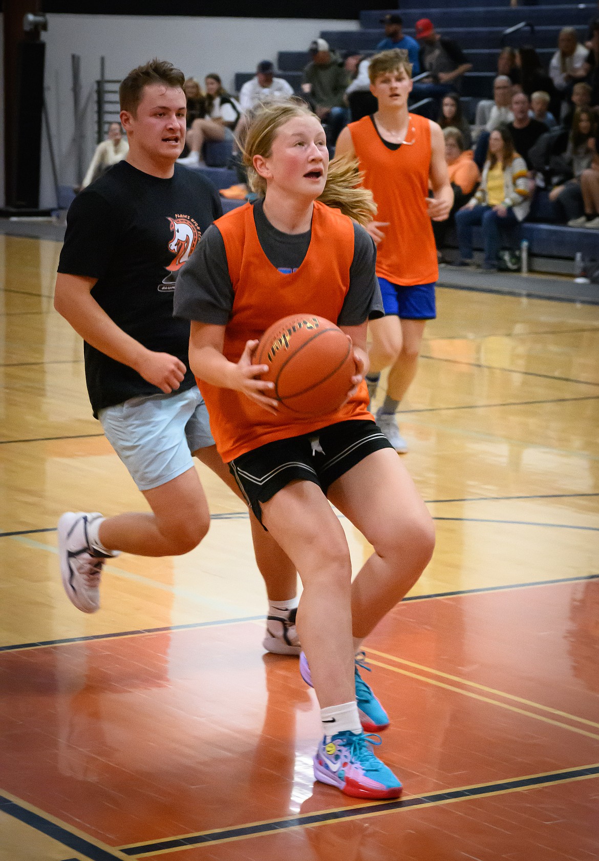 Young team member Ava Lawyer goes up for a shot. (Tracy Scott/Valley Press)