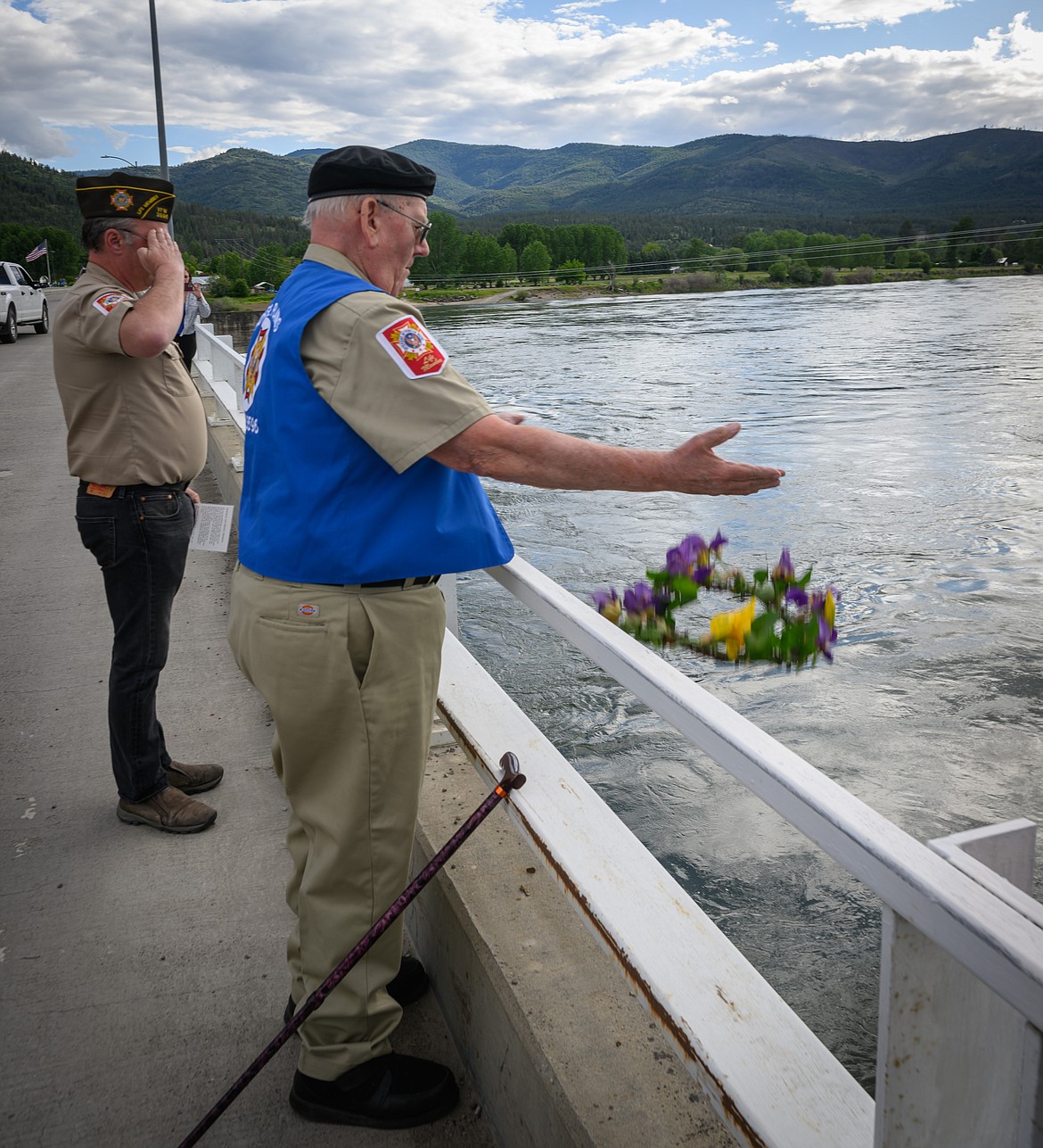 Leland Butch Murdock tosses a wreath into the Clark Fork River during a Memorial Day ceremony in Plains. (Tracy Scott/Valley Press)