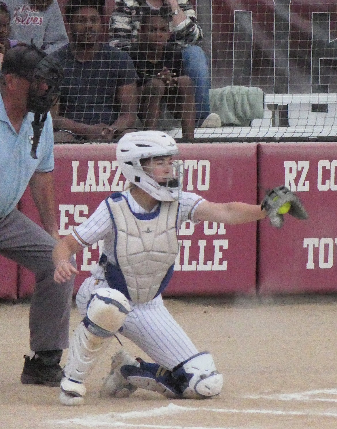 Thompson Falls junior catcher Sarah Koskela catches an incoming pitch during a playoff game versus Three Forks earlier this year. (Chuck Bandel/VP-MI)