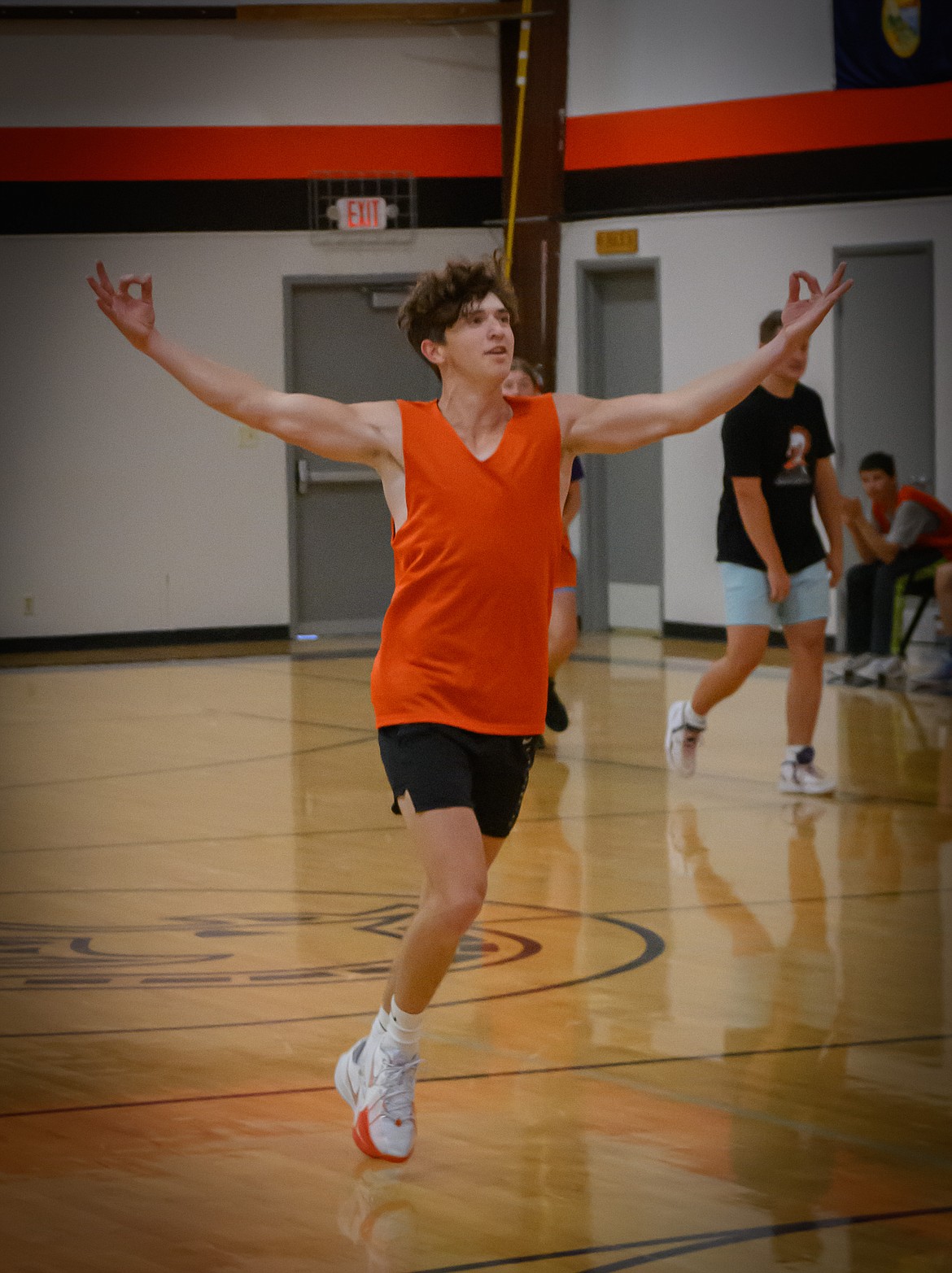 Young team member Darren Standefora celebrates after hitting a three-pointer. (Tracy Scott/Valley Press)