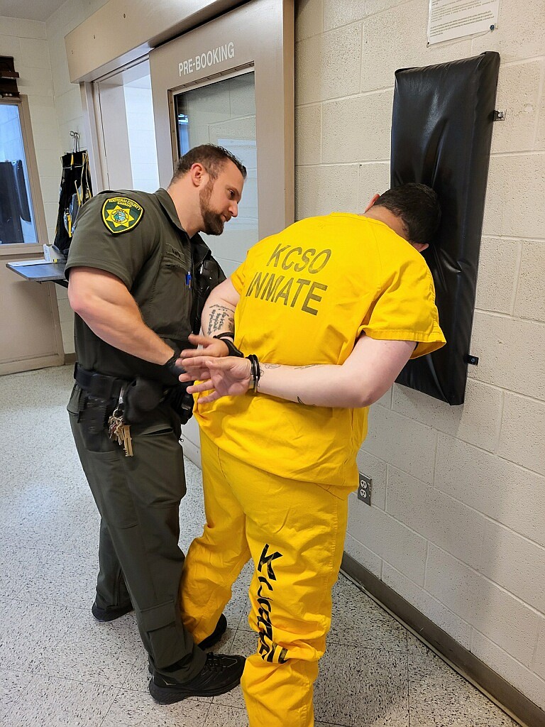 Deputy Matthew Nipper books an inmate into jail Monday. Many of the FY2025 budget increases proposed by the Kootenai County Sheriff’s Office are related to jail operations.