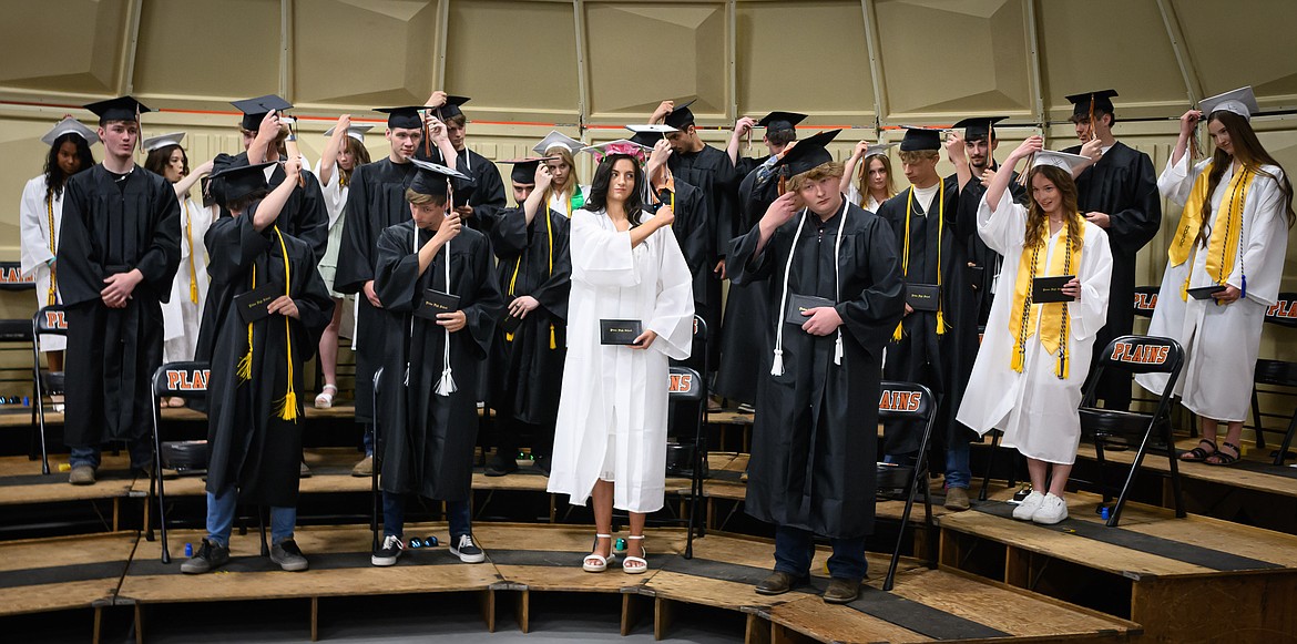 The Plains High School graduating class performs the changing of the tassel. (Tracy Scott/Valley Press)