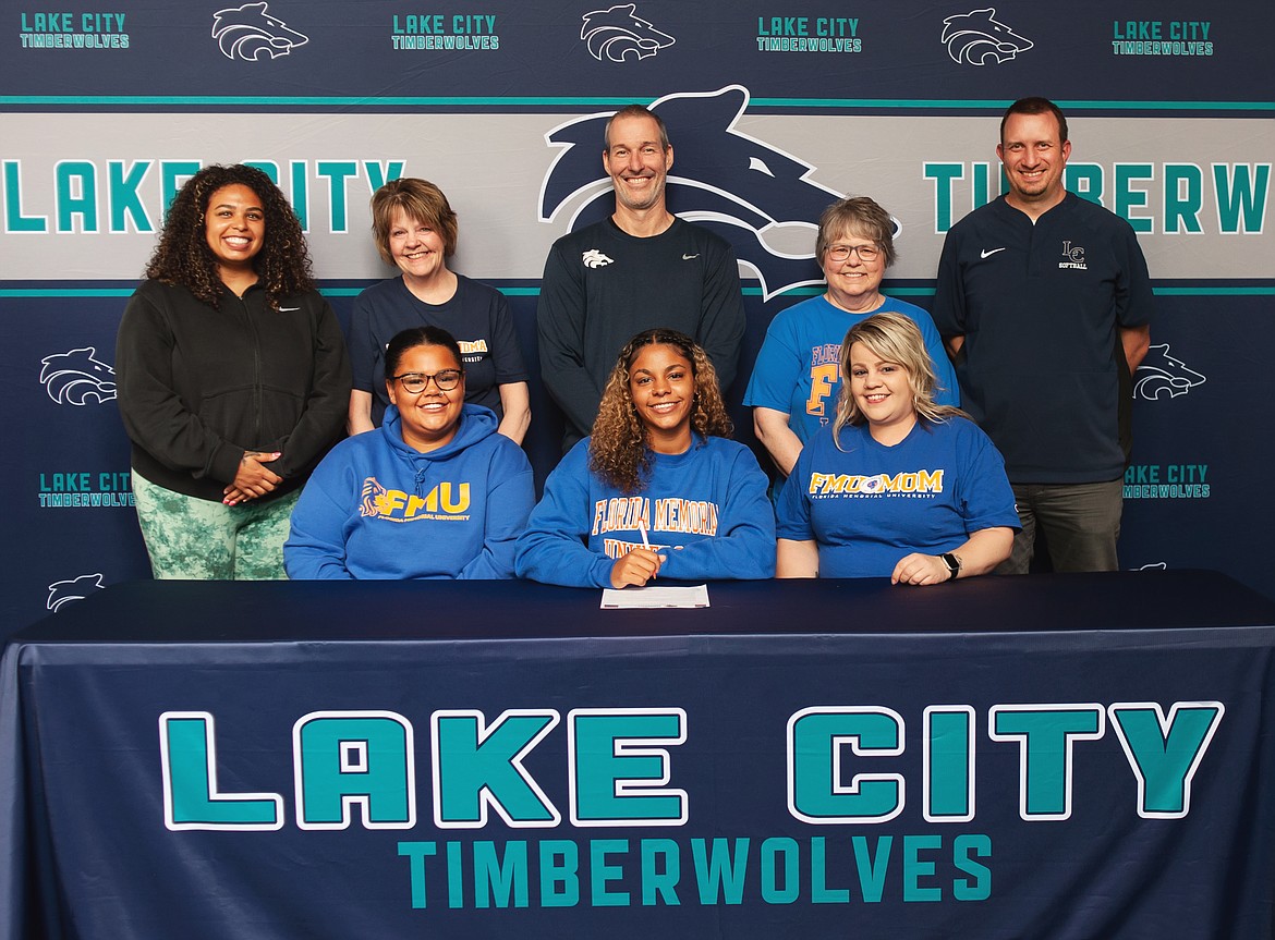 Courtesy photo
Lake City High senior KaLiah Frazey recently signed a letter of intent to play basketball at NAIA Florida Memorial University in Miami Gardens, Fla. Seated from left are Taniesha Frazey (sister), KaLiah Frazey and Katie Frazey (mom); and standing from left, Whitney Teu Teu, Lake City High assistant girls basketball coach; Terri Cline (grandmother); David Pratt, Lake City High head girls basketball coach); Tami Frazey (aunt); and Troy Anderson, Lake City High athletic director.