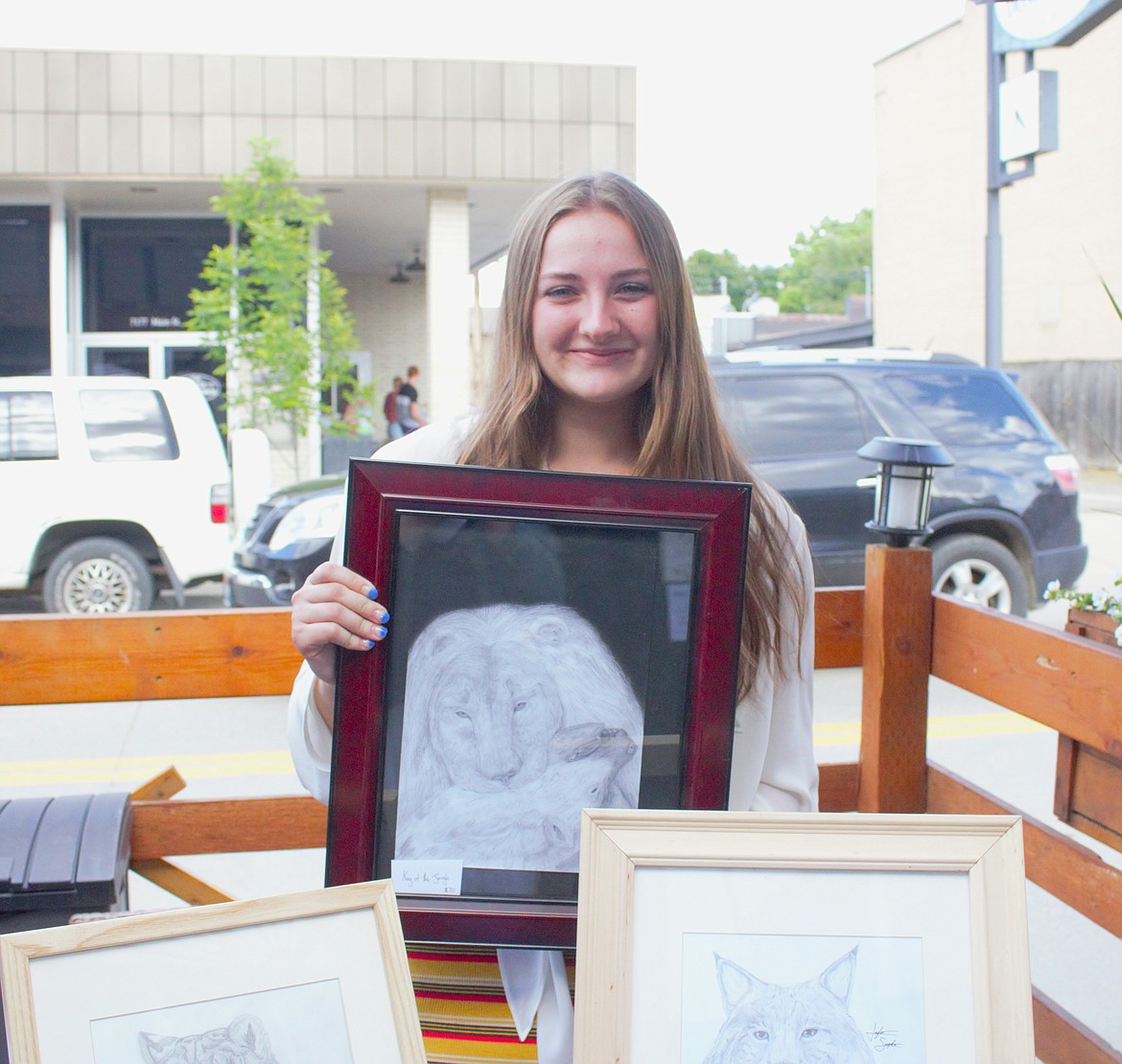 Taylor Sumpter displayed her "Lion and Hyena" and other drawing features animals at the Art Walk on May 31.