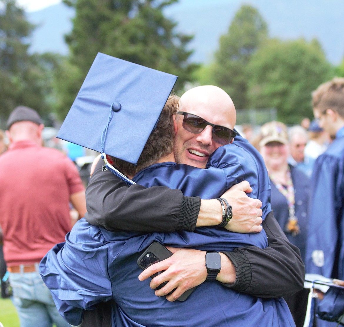 Matthew Treutelaar embraces his father at BFHS Class of 2024 graduation on June 1.