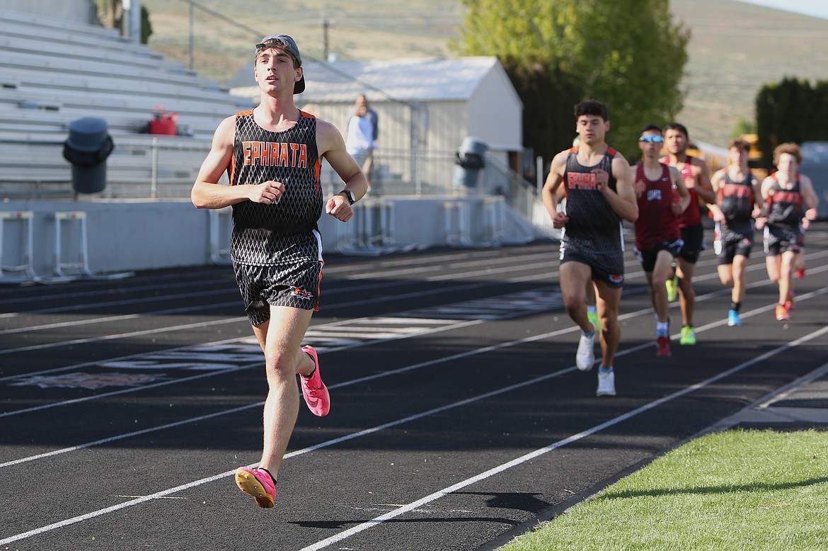 Ephrata senior Hayden Roberts, left, leads the way during the 800-meter run during a league meet against Othello on April 21. Roberts won the 2A state championship in the 800-meter run at last month’s championship meet in Tacoma.