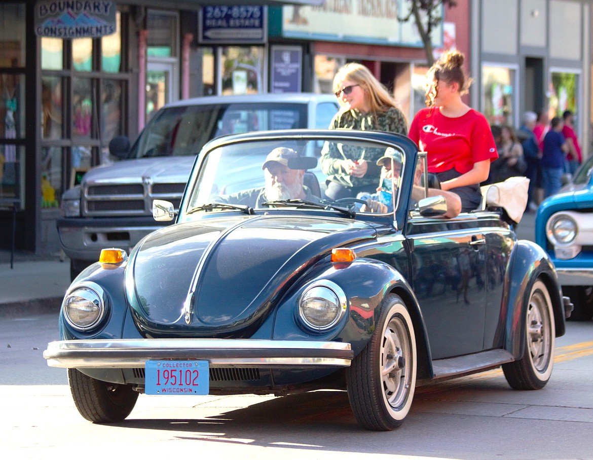 A classic Volkswagen Beetle cruises down Main Street as part of the Rod Benders Border 3 Jamboree parade on Friday, May 31.