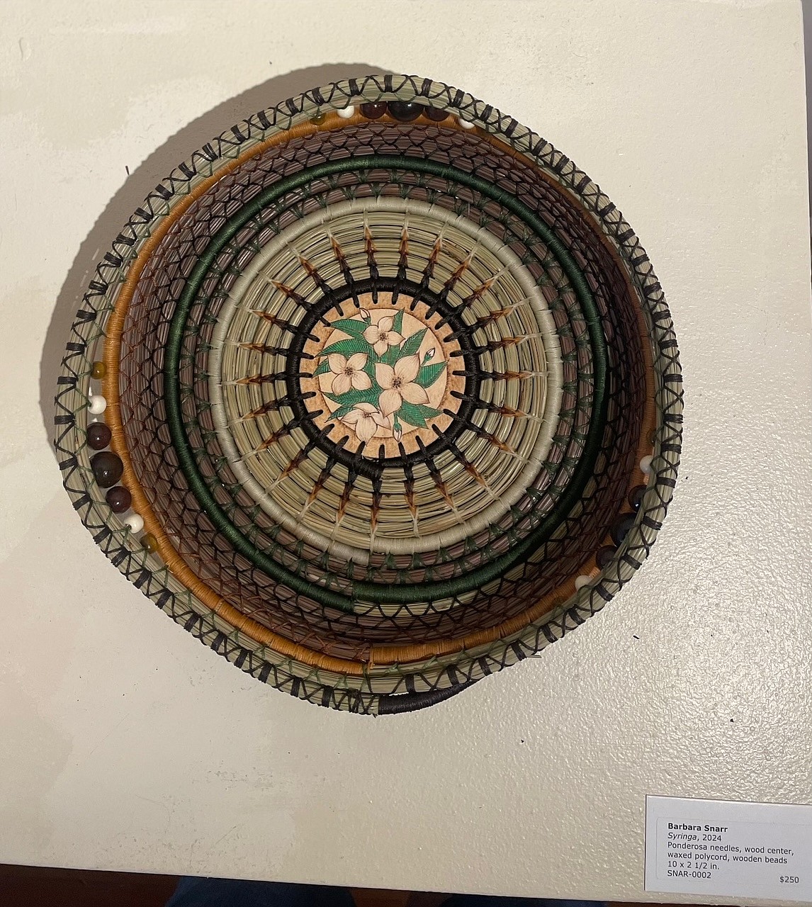 "Syringa," a woven ponderosa pine needle basket by Barbara Snarr, is on display at the Art Spirit in downtown Coeur d'Alene.