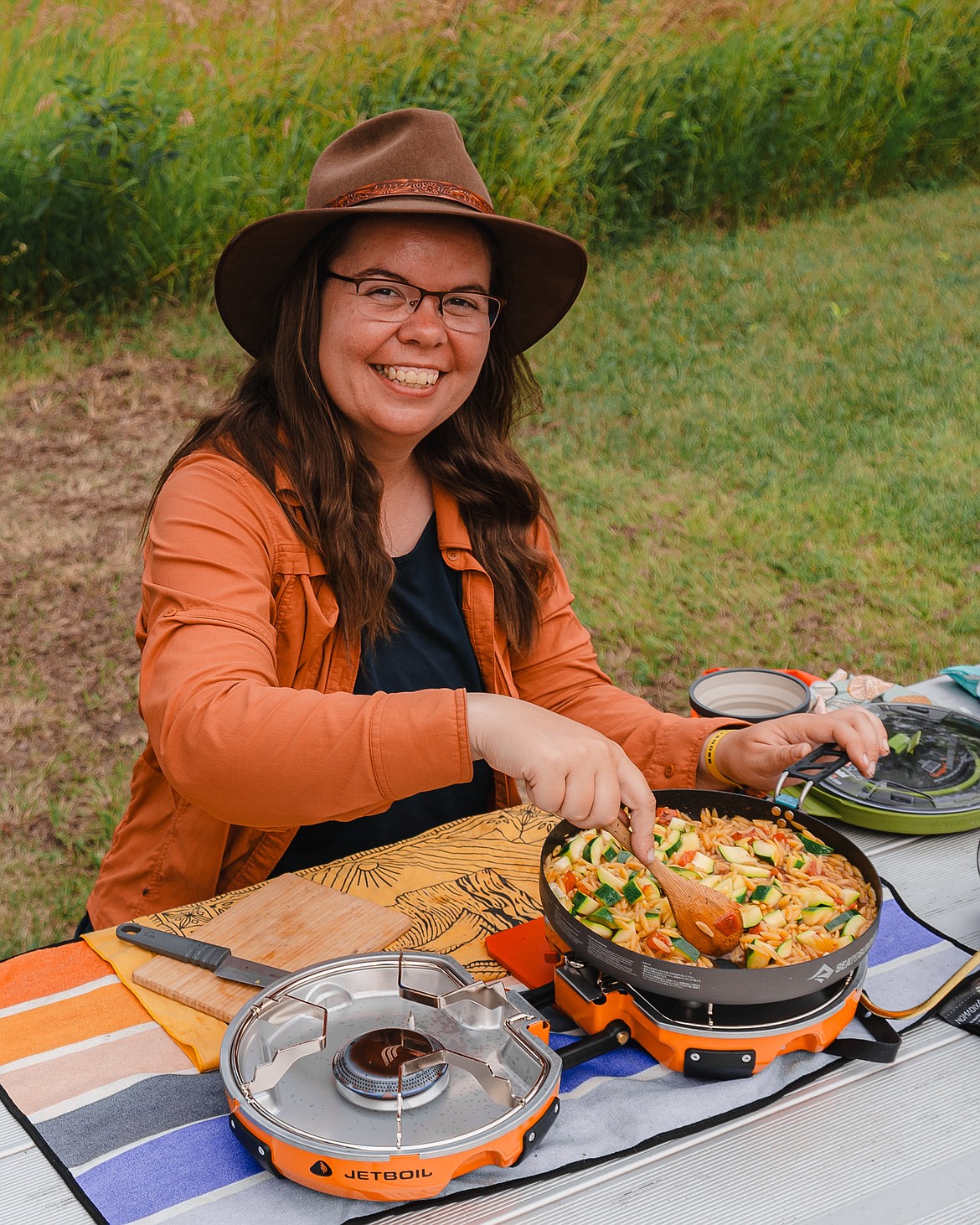 Amanda Zito cooks while motorcycle camping. (Photo courtesy of Amanda Zito)