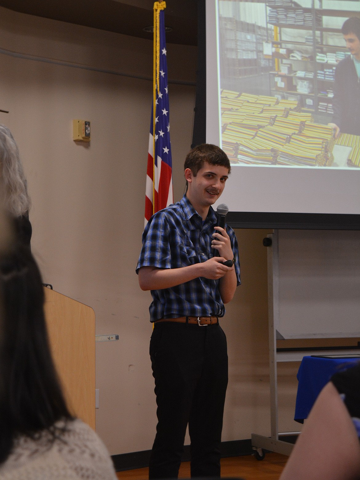 Dan Gildea tells the packed room at the Kootenai Health Resource Center about the skills he learned at his Project SEARCH internship.