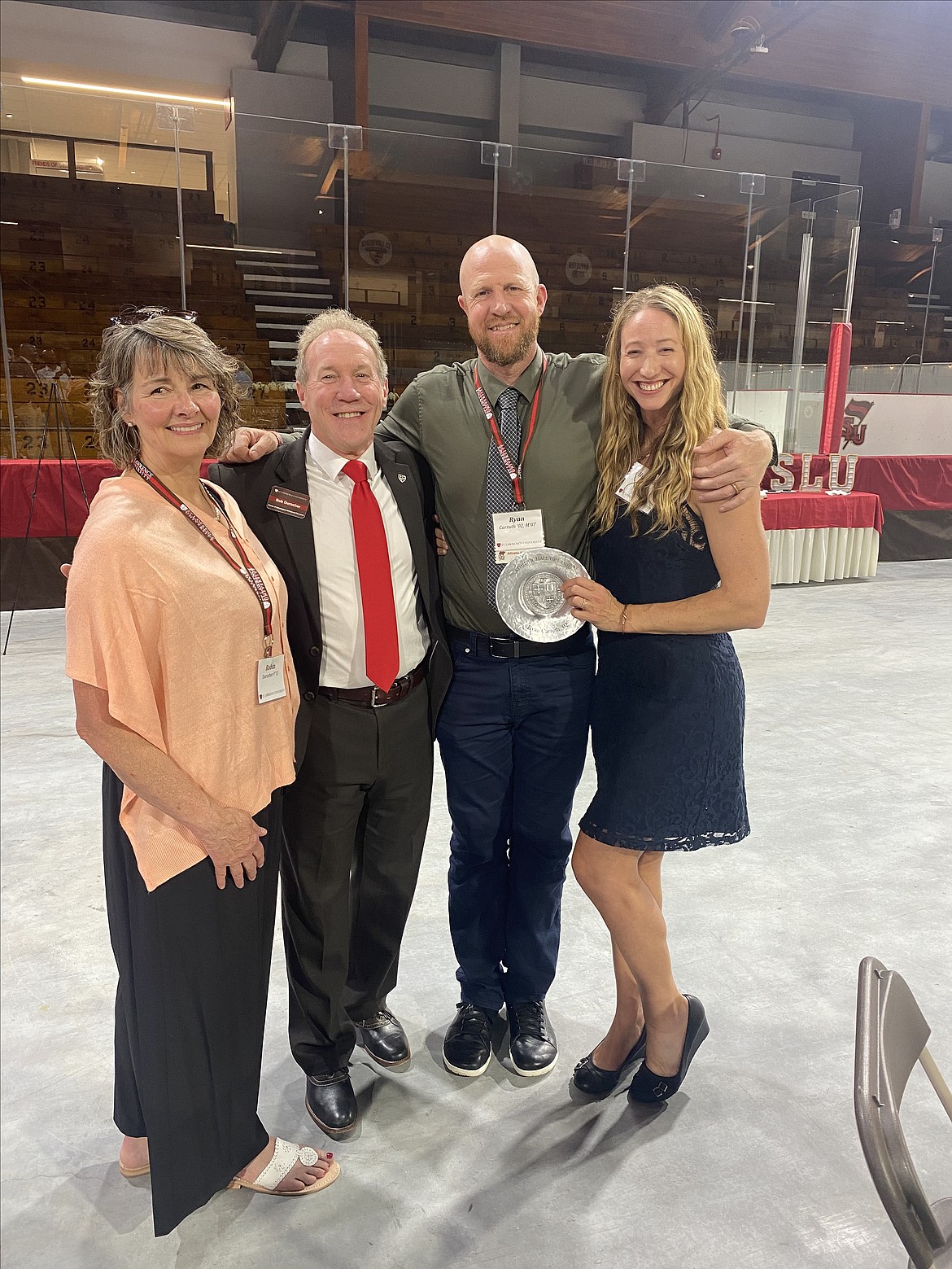 From left, Robin Durocher, Bob Durocher, Hannah Carruth and Ryan Carruth are all smiles at the HOF induction ceremony. Bob was the SLU boys soccer coach for a total of 25 years.