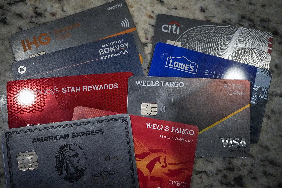 A variety of credit cards are shown on Jan. 18, 2024, in Atlanta. Seriously overdue credit card debt is at the highest level in 14 years, and people 35 and under are struggling more than other age groups to pay their bills. (AP Photo/Mike Stewart, File)