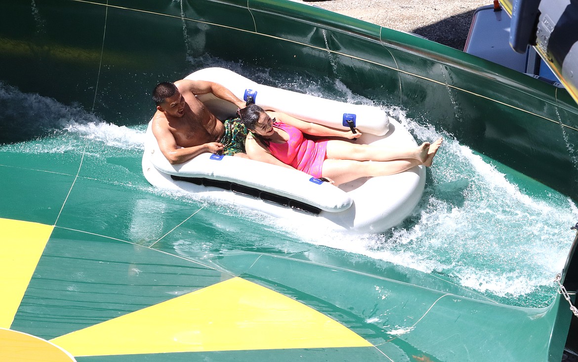 Riders soar around a turn on Eagle Hunt, the new water ride at Silverwood Theme Park on Saturday.