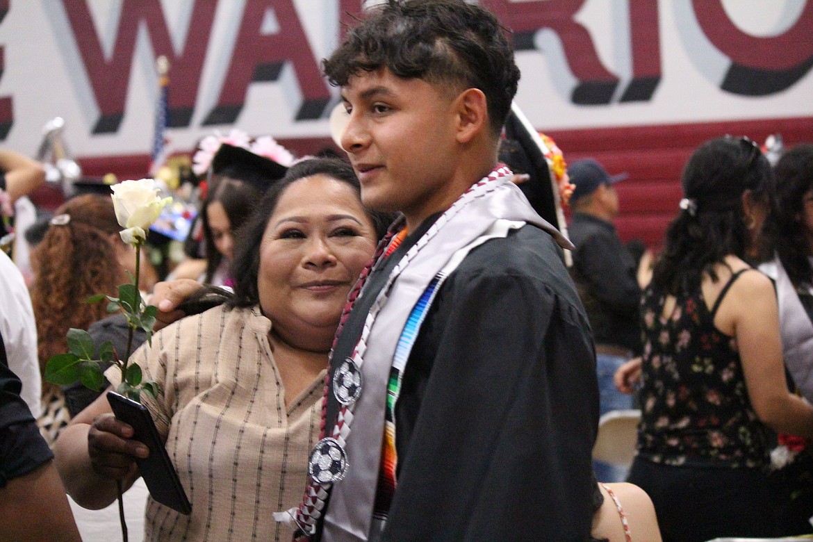 It’s a tradition at Wahluke High School for seniors to give a rose to those family and members and friends who helped them get to graduation.