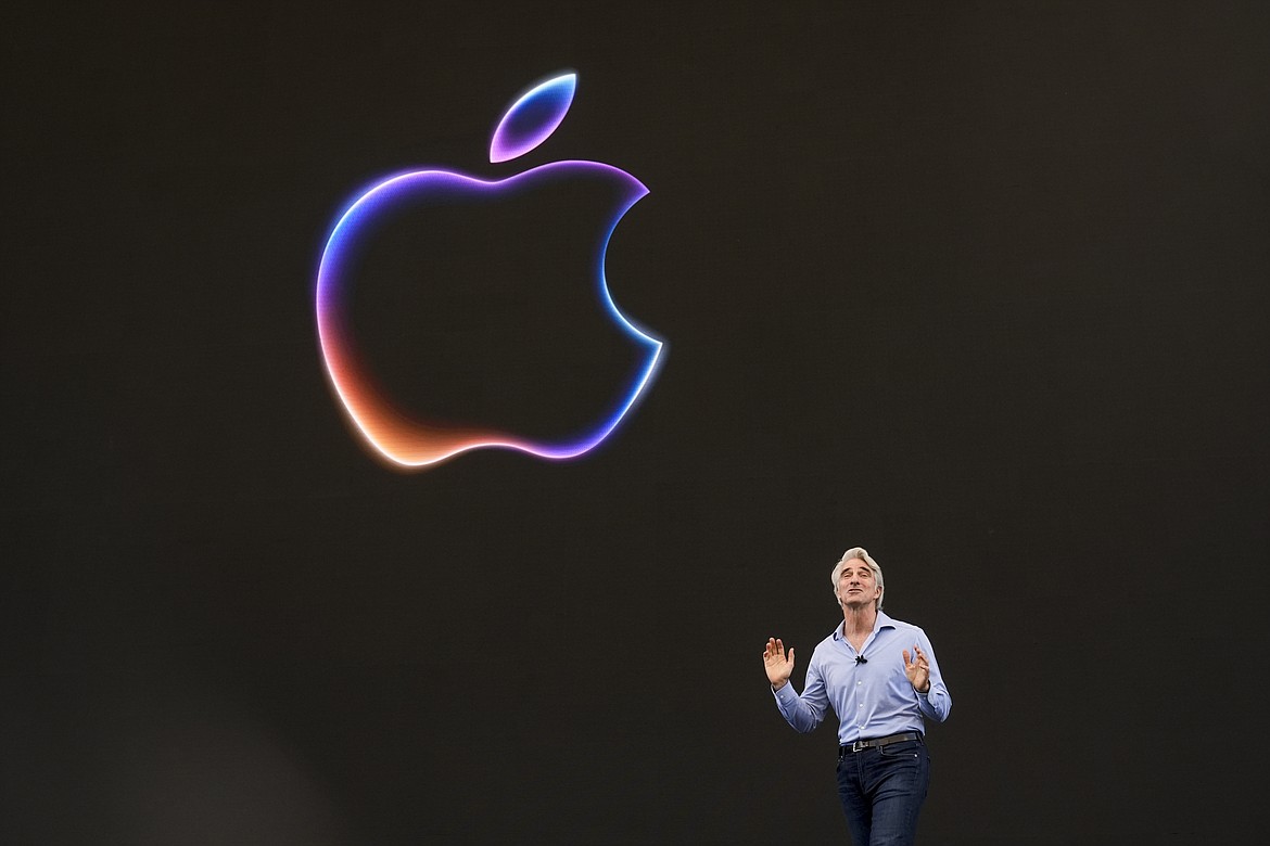 Craig Federighi, Apple's senior vice president of software engineering, speaks during an announcement of new products at the Apple campus in Cupertino, Calif., on Monday, June 10, 2024. (AP Photo/Jeff Chiu)