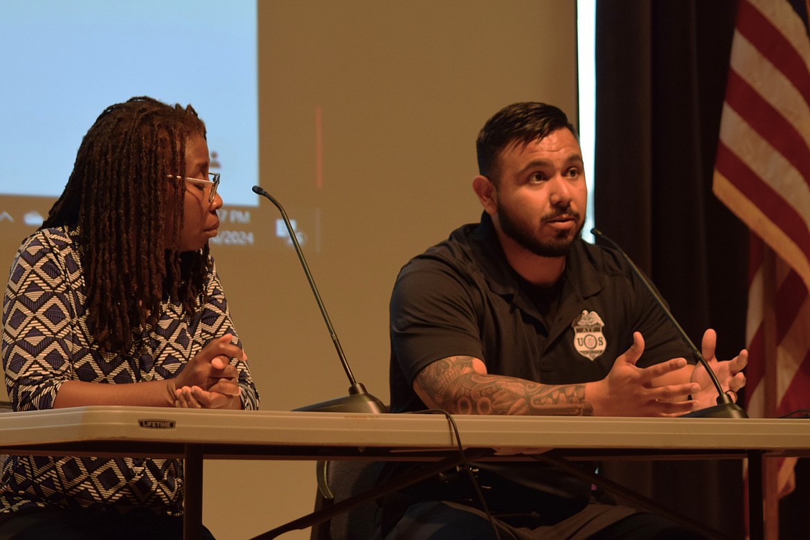 Corporal Omar Ramirez, right, the lead detective for the Moses Lake Police Department's Street Crimes Unit, answers questions about gang activity in Moses Lake during the Moses Lake Community Coalition’s annual town hall Thursday night at the Moses Lake Civic Center.