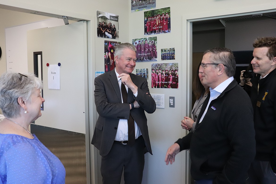 Gov. Brad Little chats with North Idaho College President Nick Swayne during a visit to the Coeur d'Alene campus in April.