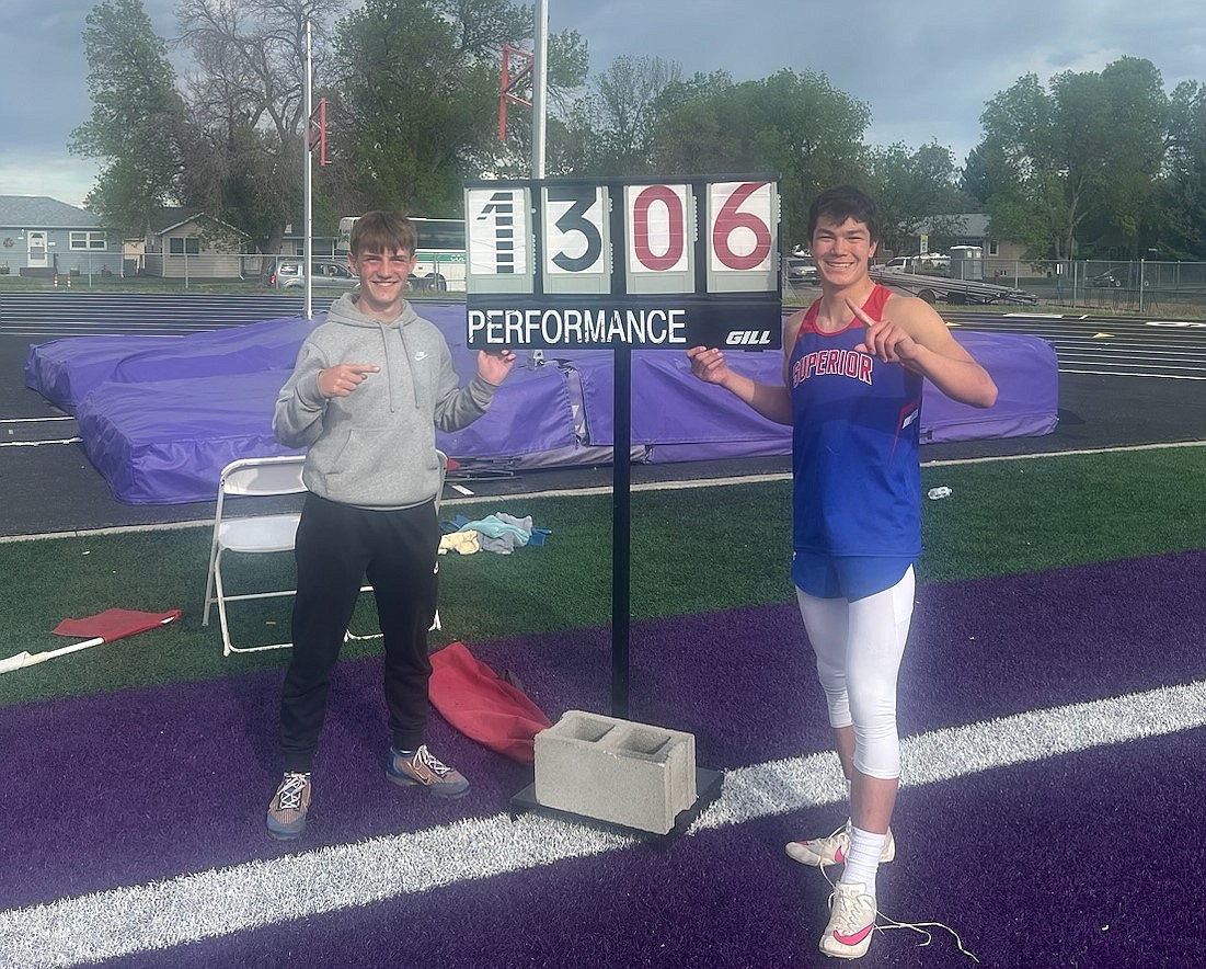 State pole vault champion Lucas Kovalsky (right) stands with Superior teammate Gannon Quinlan following Kovalsky's winning jump during the state Class B championship in Laurel last month. (Photo by Byron Quinlan)