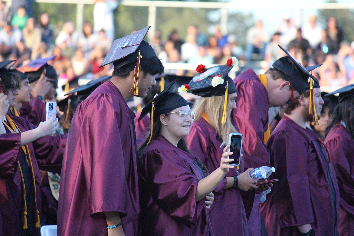 Two new MLHS graduates snap a selfie.