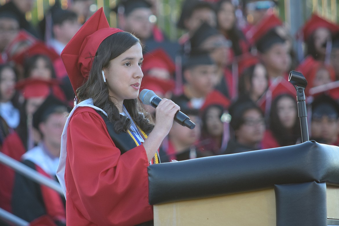 Othello High School senior Olivia Gonzalez, one of the Class of 2024’s two valedictorians, gives a speech during Friday’s ceremony.