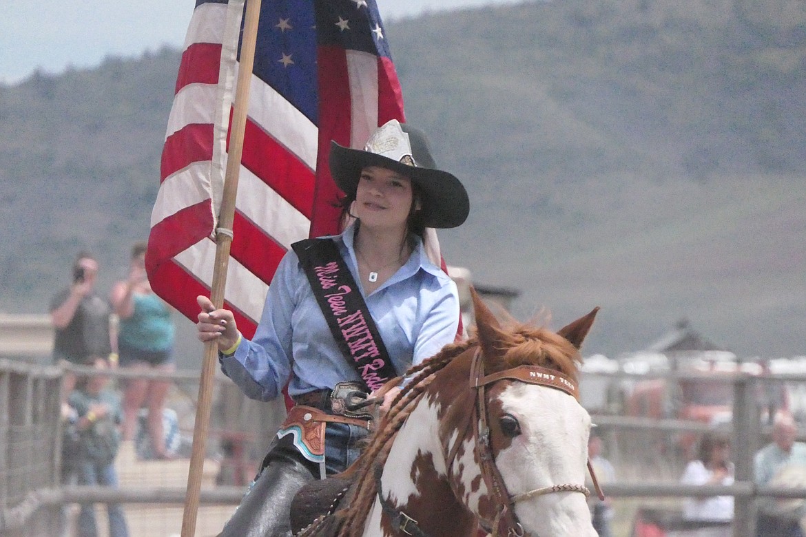 The colors are presented by a Miss Teen Rodeo rider during Sunday's opening ceremony for the Homesteader Days Rodeo in Hot Springs. (Chuck Bandel/VP-MI)