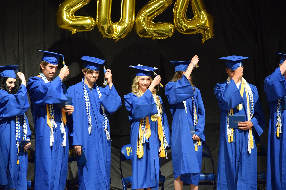 Wilson Creek High School graduating seniors move their tassel from one side of their cap to the other, marking the certification of their graduation.