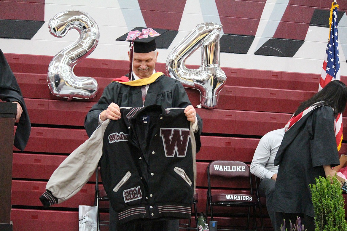 Wahluke High School class of 2024 guest of honor Matt Watrous received a token of appreciation for his 18 years of service at the school during WHS graduation ceremonies.