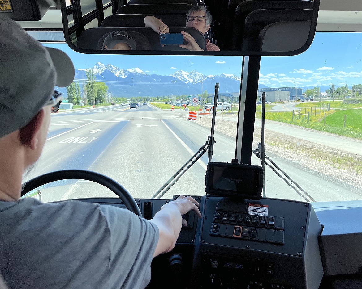 Matt Gaut, the transportation director for the Ronan School District, prepares to make a right hand turn from Hwy. 93 onto Third Street on the final day of school last Friday. The white truck at the intersection was driven by the bus mechanic; both volunteered to give the reporter firsthand look at the perils of the reconfigured intersection. (Kristi Niemeyer/Leader)