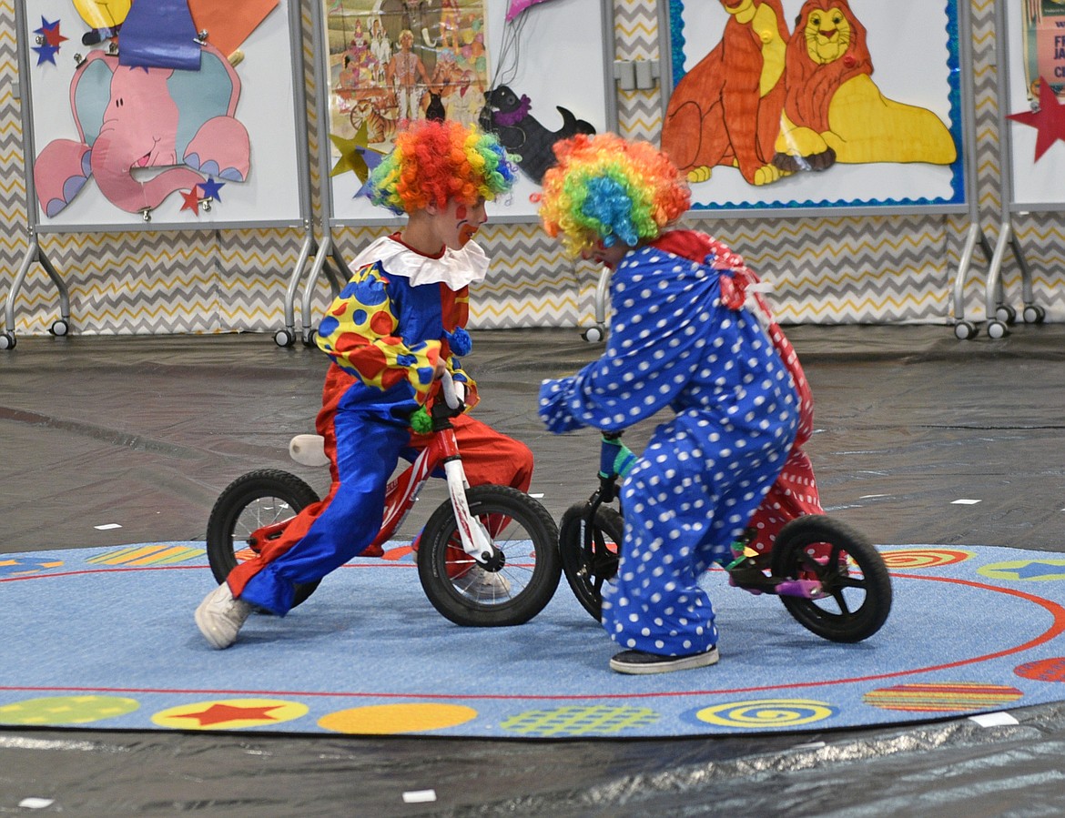 Clowns go head to head at the Muldown Elementary Circus on Friday. (Kelsey Evans/Whitefish Pilot)