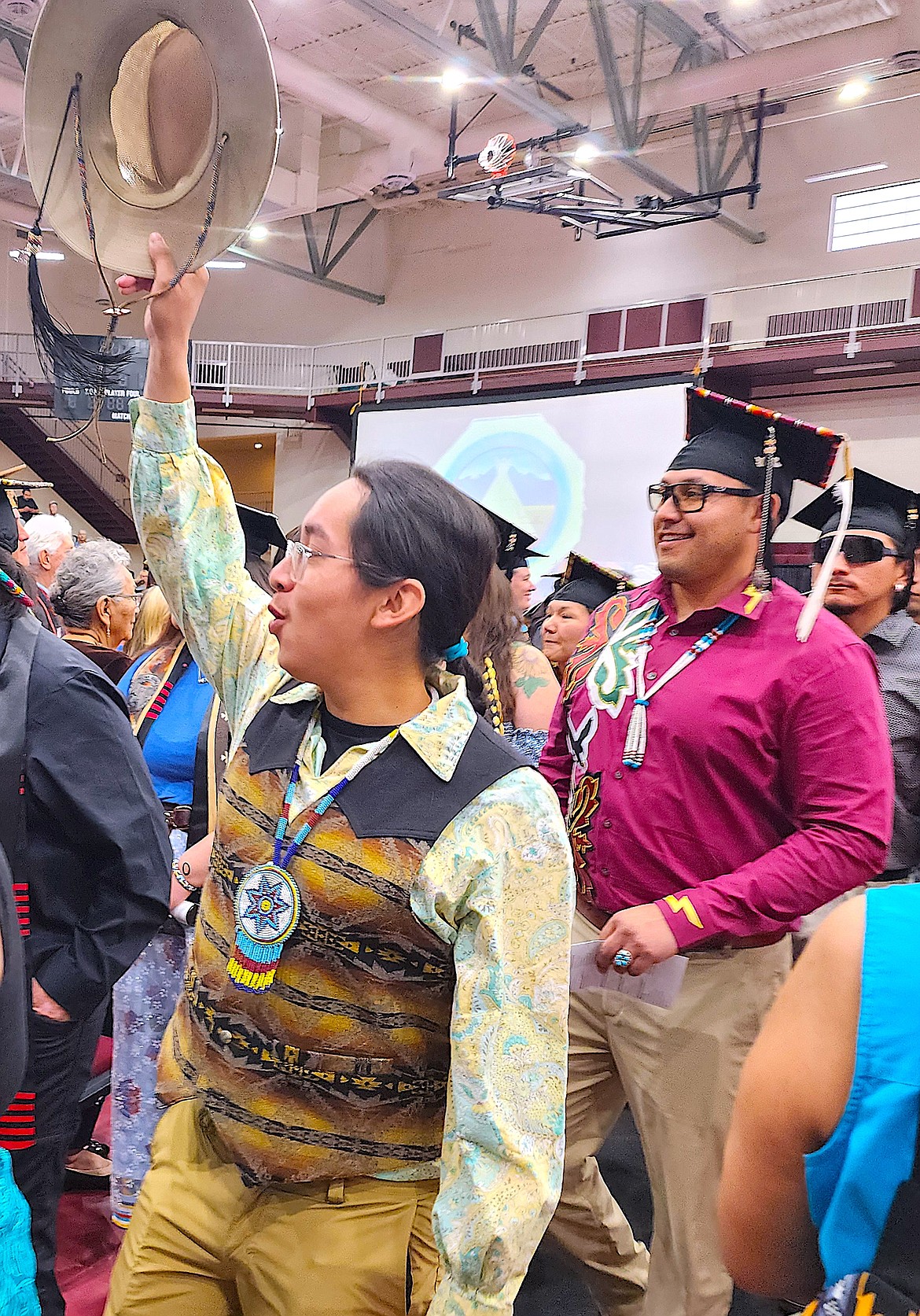 2024 SKC graduate Quincy Williams waves his hat in celebration of the day; Williams earned a Bachelor of Science degree in Elementary Education. (Berl Tiskus/Leader)