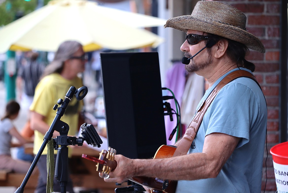 Steve Wyttree of Post Falls performs on Sherman Avenue on Monday for the start of Street Music Week.