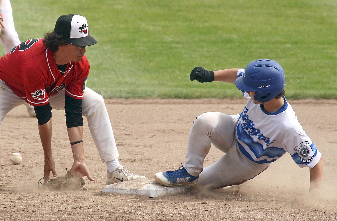 Libby's Brody Gilmore steals second base against the Cranbrook Bandits in the second game of a doubleheader Sunday, June 9, 2024, at Lee Gehring Field in Libby. (Paul Sievers/The Western News)