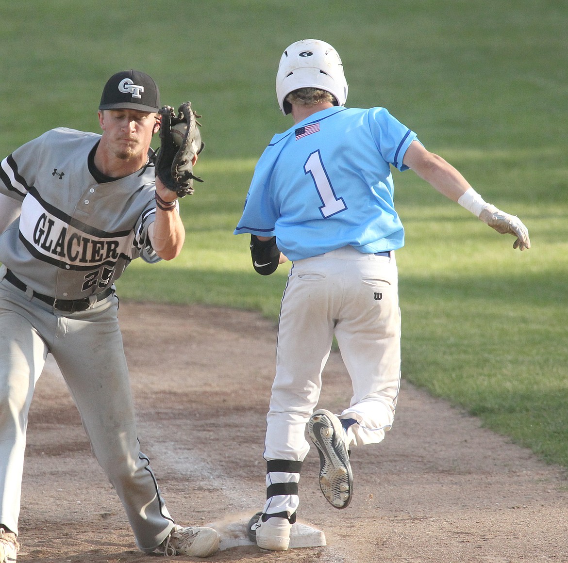 Libby's Mason Crowe was safe after beating the throw at first base in the bottom of the first inning against the Glacier Twins in the nightcap of a doubleheader Monday, June 10, 2024. (Paul Sievers/The Western News)