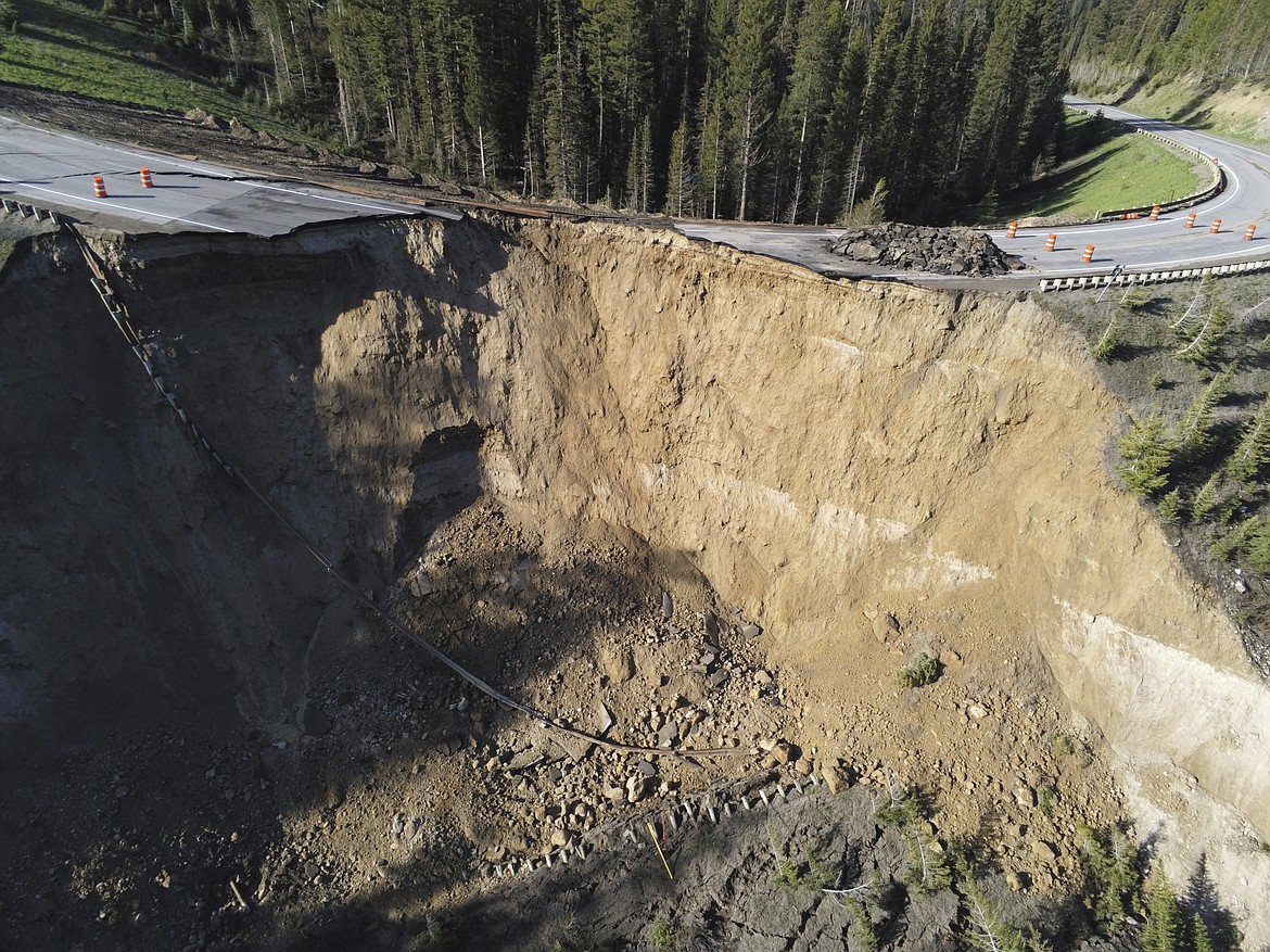 This photo provided by Wyoming Highway Patrol shows a damaged section of Teton Pass near Jackson, Wyo., on Saturday, June 8, 2024, that officials said had “catastrophically failed.” (Wyoming Highway Patrol via AP)