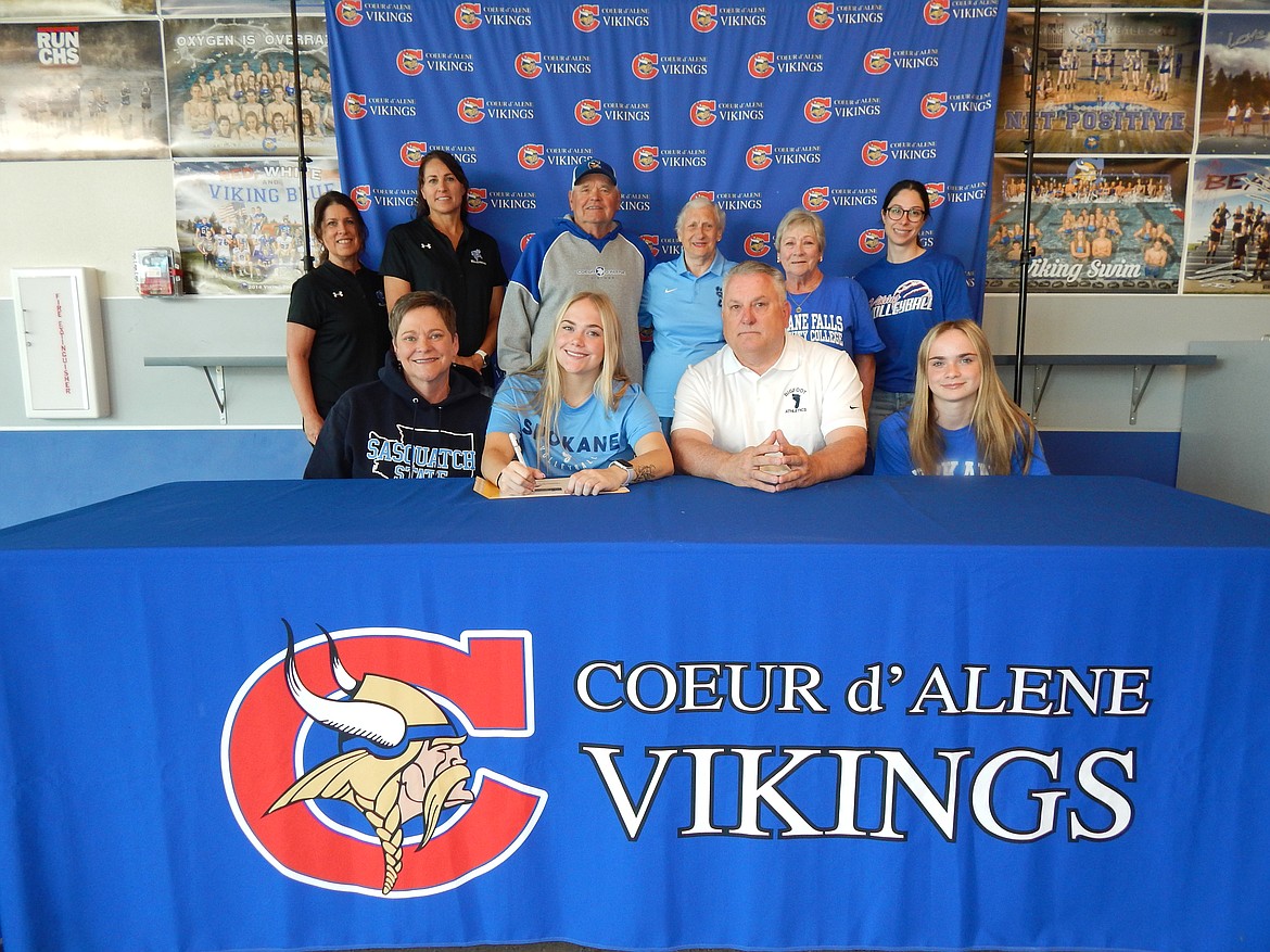 Courtesy photo
Coeur d'Alene High senior Bailey Jaworski recently signed a letter of intent to play volleyball at Community Colleges of Spokane. Seated from left are Keri Carter (mom), Bailey Jaworski, Dave Jaworski (dad) and Jaime Jaworski (sister); and standing from left, Joyce Nida (Coeur d'Alene High assistant volleyball coach), Carly Curtis (Coeur d'Alene High head volleyball coach), Larry Schwenke (grandpa), Maryann Jaworski (grandma), Laurie Schwenke (grandma) and Victoria Beecher (Coeur d'Alene High athletic director).