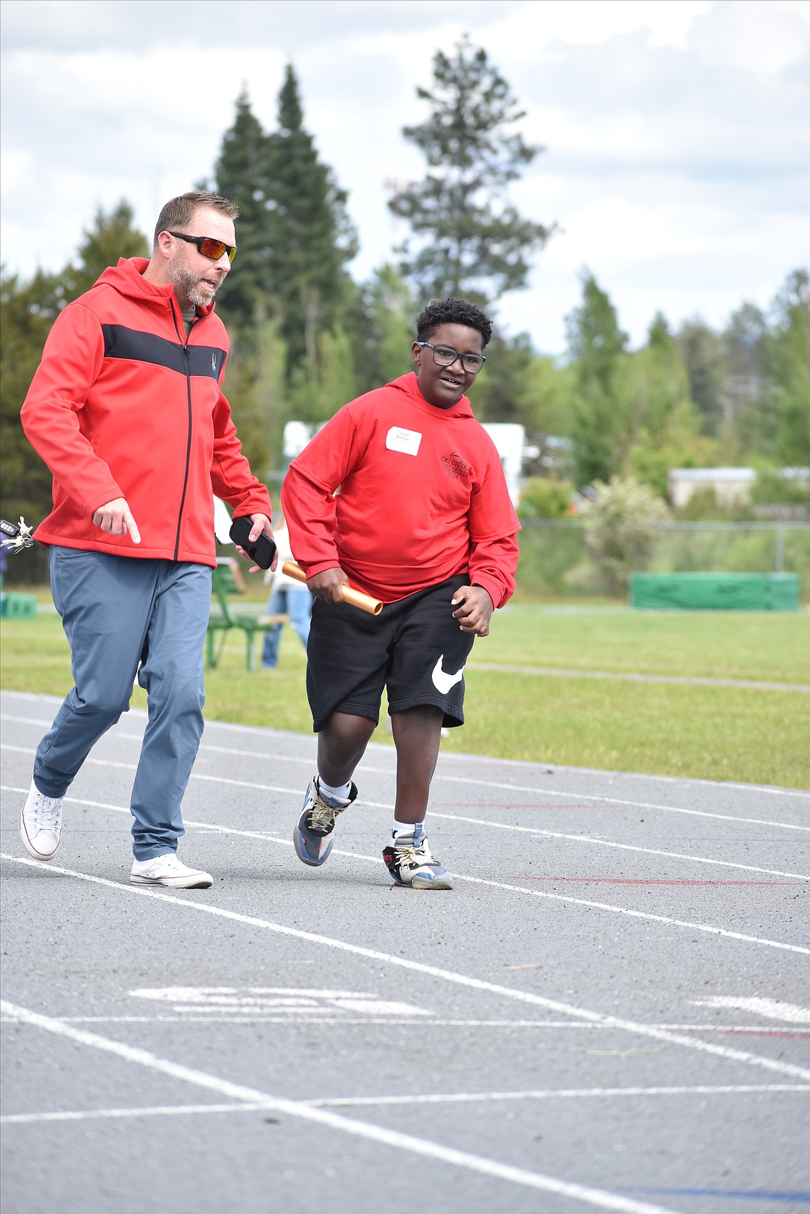 Sixth-grader Yisak Brewer was cheered on by his dad, Eric Brewer during Lakeland Life Skills Track and Field Invitational at Lakeland High School. Yisak is a student at Canfield Middle School.