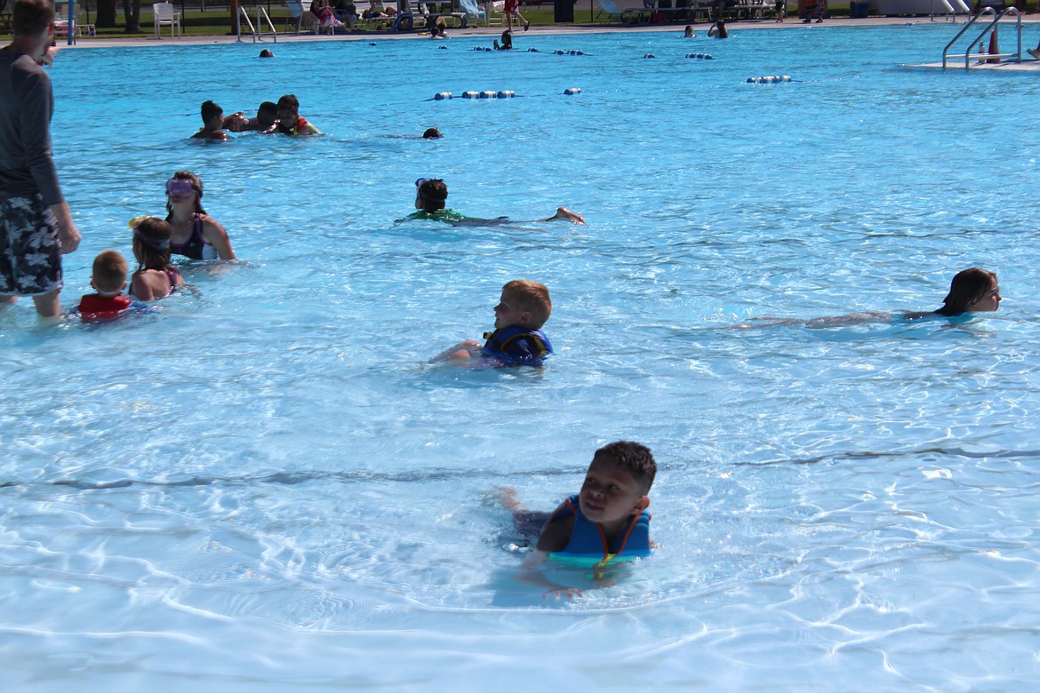 Children play in the zero-entry end of the Surf ‘n Slide water park in Moses Lake. As temperatures approach the triple digits, pools in and around Grant and Adams counties will offer welcome reprieves from the heat.