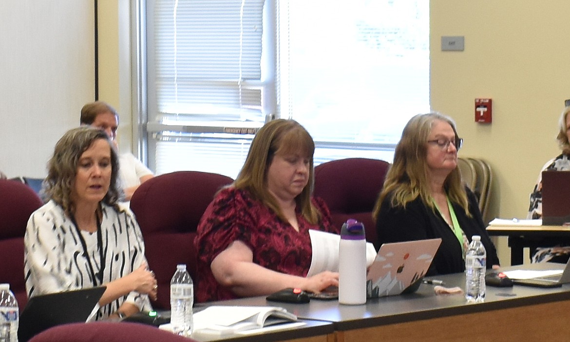 From left: Moses Lake School District Acting Superintendent Carol Lewis, with Human Resources Director Michelle Musso and Executive Director of Elementary Education Robbie Mason, lay out the district’s financial picture to the school board at a special study session Monday.