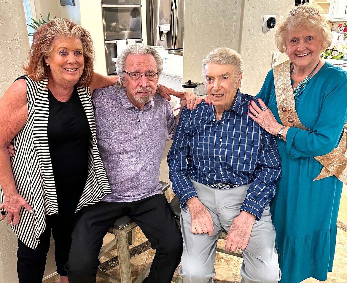 Coeur d’Alene friends Steve and Kathy LaTourrette pay a surprise visit on Valleda Woodhall’s 90th birthday.