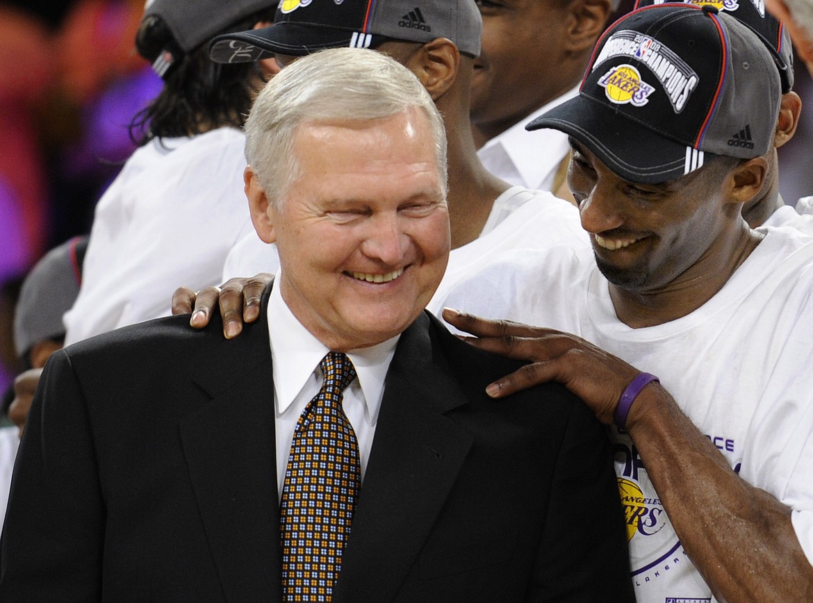 Los Angeles Lakers' Kobe Bryant with basketball great Jerry West after the Lakers beat the San Antonio Spurs in Game 5 of the NBA Western Conference basketball finals in Los Angeles, May 29, 2008. Jerry West, who was selected to the Basketball Hall of Fame three times in a legendary career as a player and executive and whose silhouette is considered to be the basis of the NBA logo, died Wednesday morning, June 12, 2024, the Los Angeles Clippers announced. He was 86. (AP Photo/Kevork Djansezian, File)