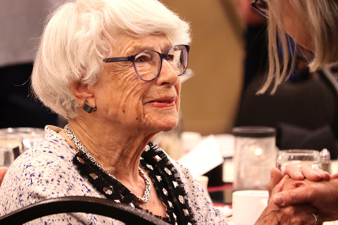 Carla Peperzak, a Holocaust survivor, greets an admirer following the Kootenai County Task Force on Human Relations luncheon at the Best Western Plus Coeur d'Alene Inn on Wednesday.