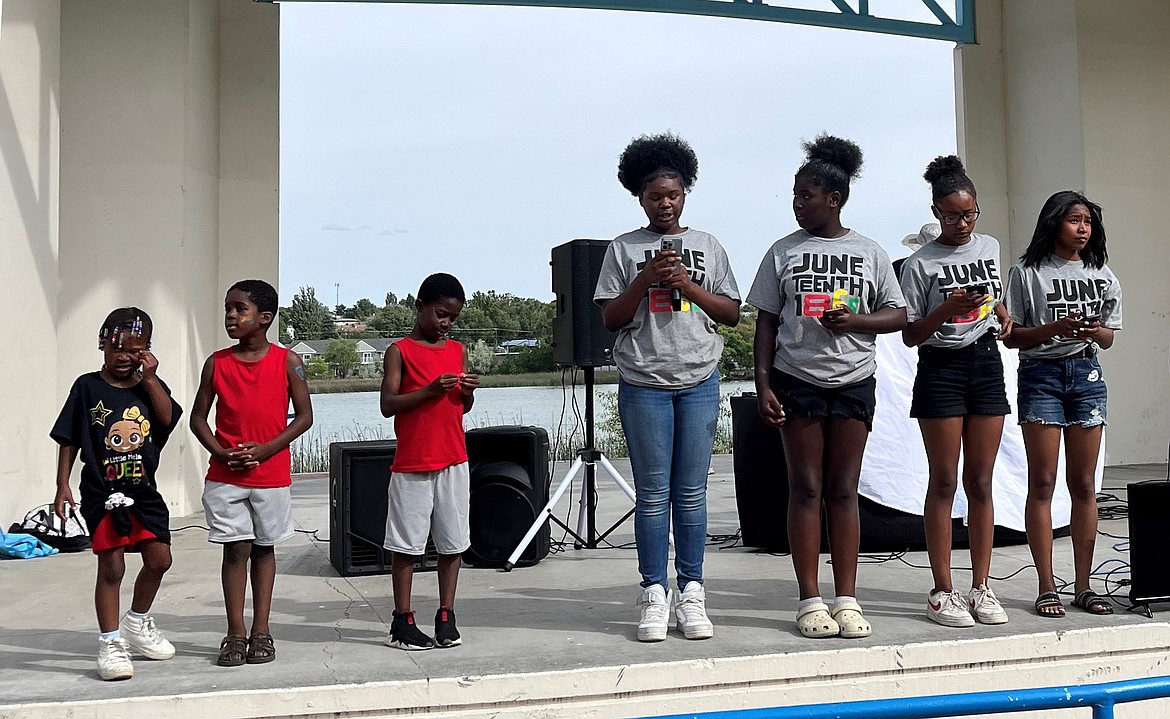 Youth speak at the Centennial Amphitheater at last year’s Juneteenth celebration. This year’s event is Monday.