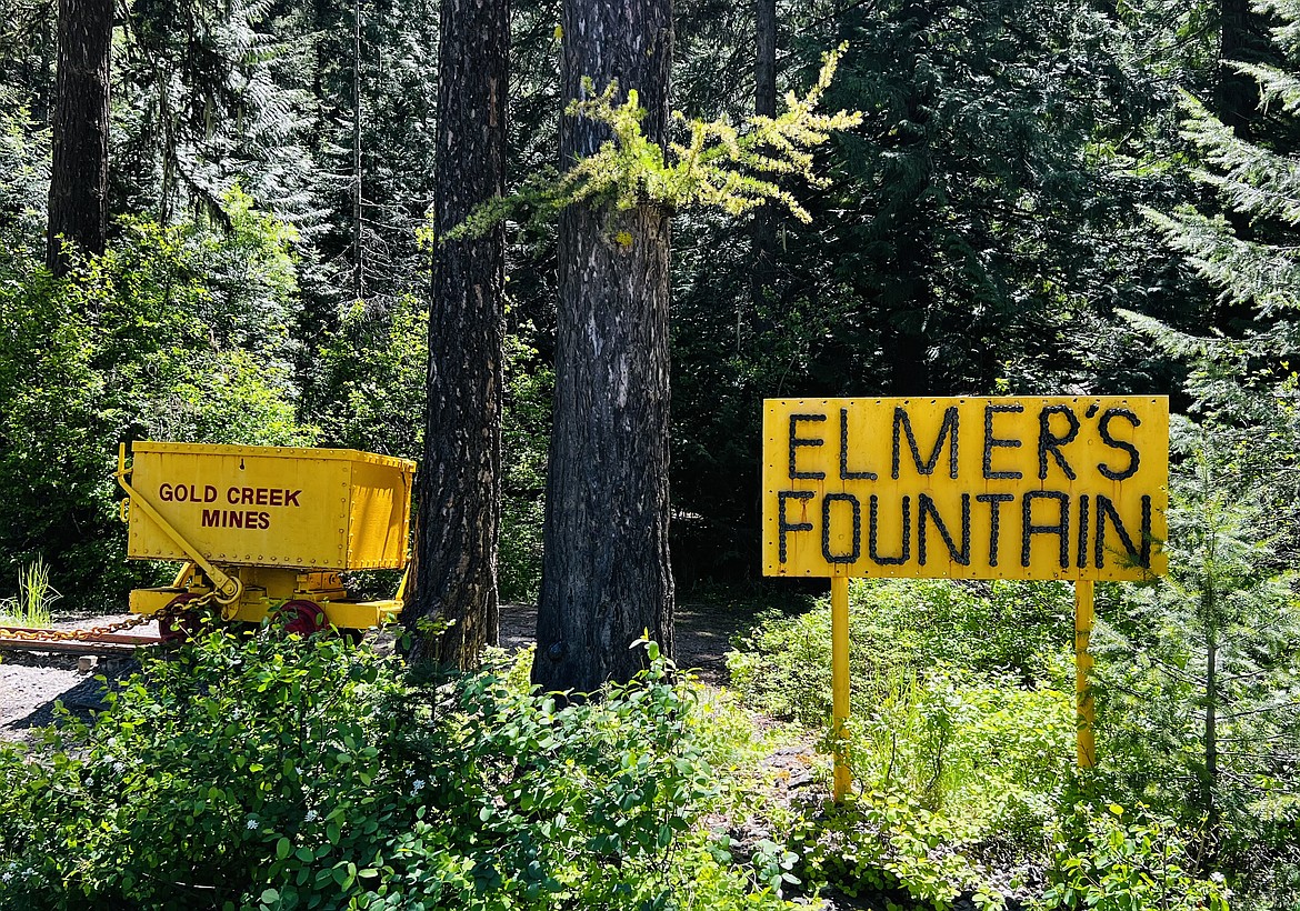 When people arrive at Elmer's Fountain they are greeted by a sign signifying the fountains and a mine cart denoting the site of the former Gold Creek Mines.