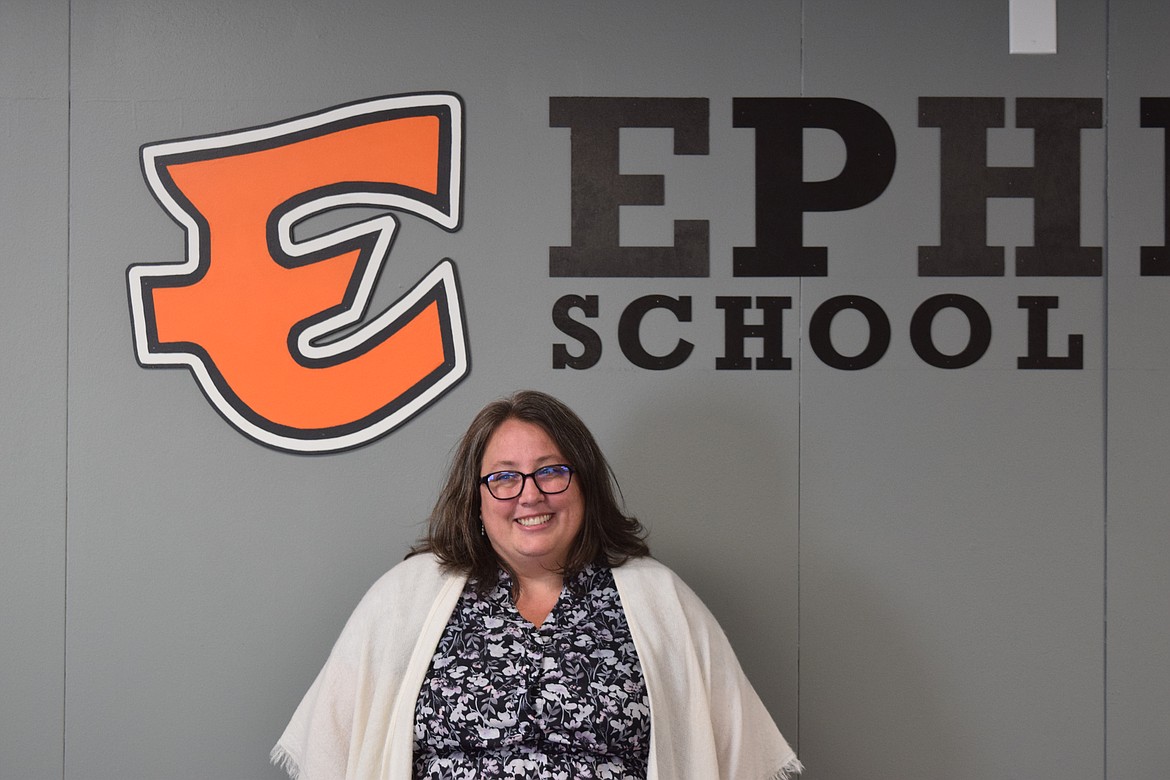 Ashlie Miller shares a laugh with an off-camera Ephrata School District staff member at the Ephrata School District’s office. Miller takes over at Ephrata High School on July 1.