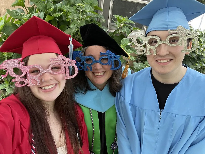 Ashlie Miller, incoming principal for Ephrata High School, poses for a photo with her daughter, Aysha, in red, and son Chayse, in blue. Miller holds several degrees and is fluent in English and Spanish.