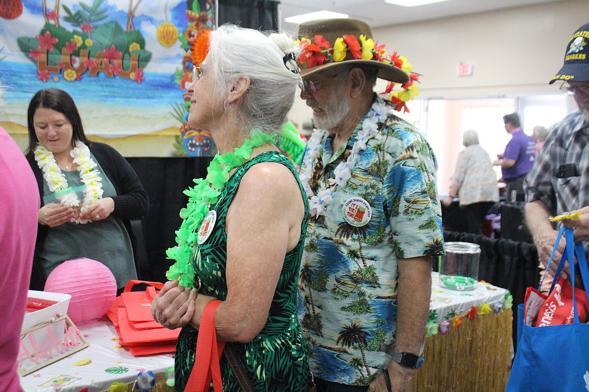 Flower leis and tropical shirts were ubiquitous at the senior picnic Wednesday.